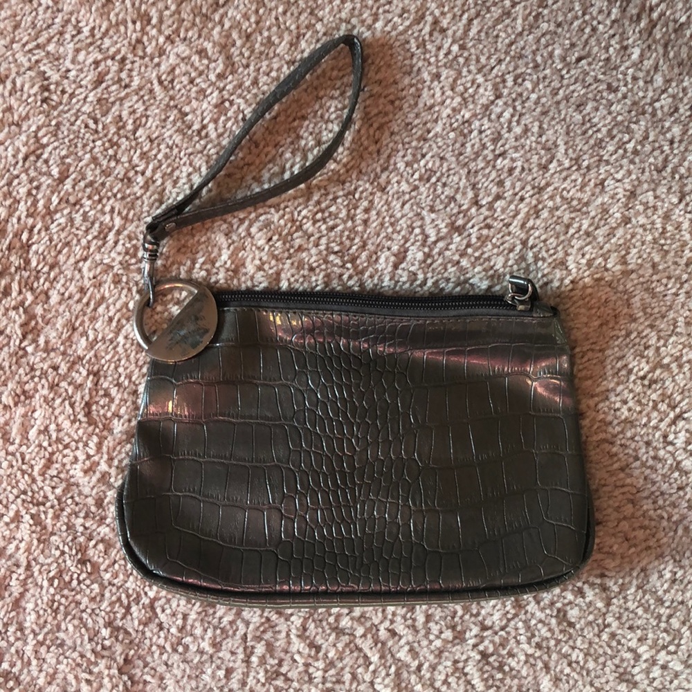 Claire’s faux crocodile skin wristlet